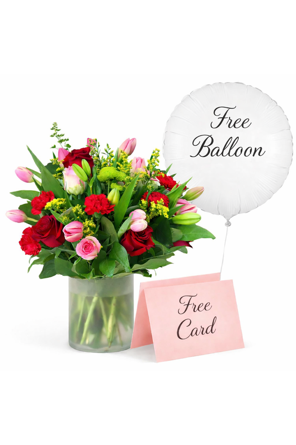 Mixed flower bouquet with roses tulips and carnations in vase with free balloon and greeting card by Eclore Floral Hackensack NJ