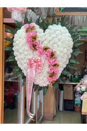 Artificial white carnation heart with curved pink and gold roses on standing easel – funeral sympathy arrangement by Eclore Floral NJ
