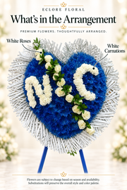 Eclore Floral — What's in the Arrangement: Custom Initials Heart Standing Spray [SS007]. Flower identification guide with seasonal availability disclaimer.