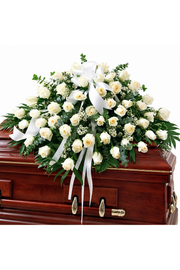 Ivory Grace white rose casket spray with baby's breath, greenery and white satin ribbon