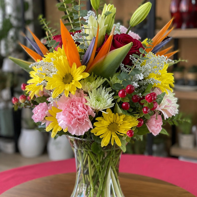 Lola Collection mixed flower arrangement shown from a three-quarter angle.