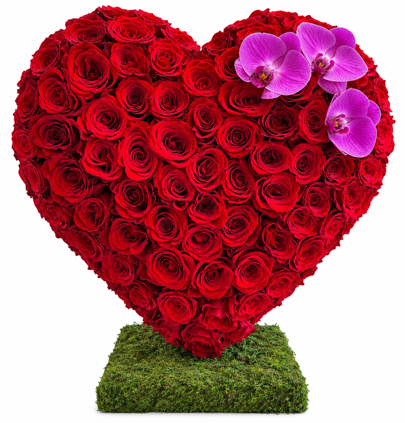 Luxury heart-shaped red rose arrangement with purple orchids on a moss base