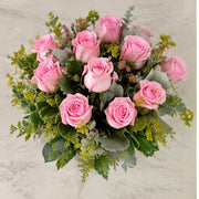Pink Bubble rose arrangement viewed from above.