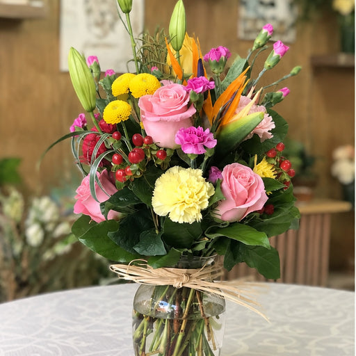 Summer Blossom flower arrangement shown in a natural front view.