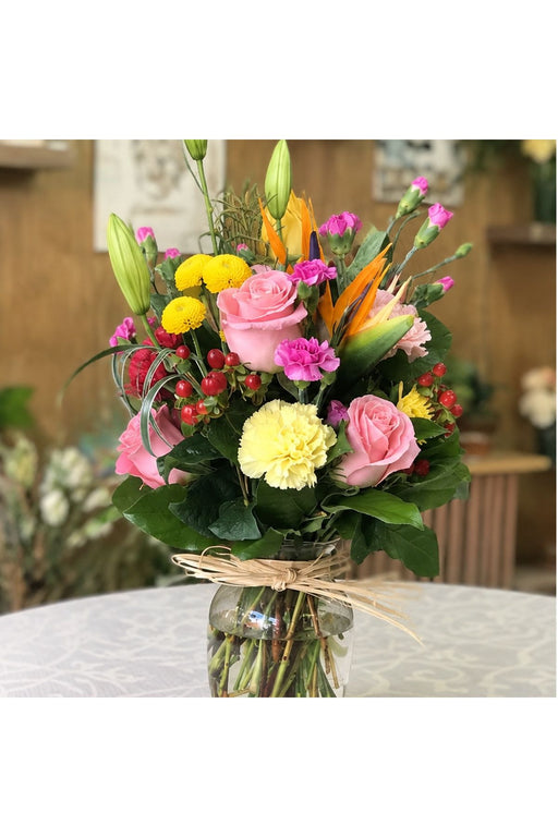Summer Blossom flower arrangement shown in a natural front view.