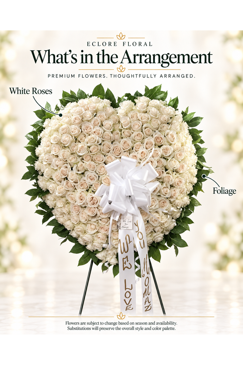 Eclore Floral — What’s in the Arrangement: Full Rose Heart [SS009] – White Rose Standing Heart Tribute. Flowers may vary with season and availability.