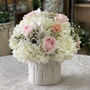 White Stripes pink rose and white hydrangea arrangement shown from a three-quarter angle.