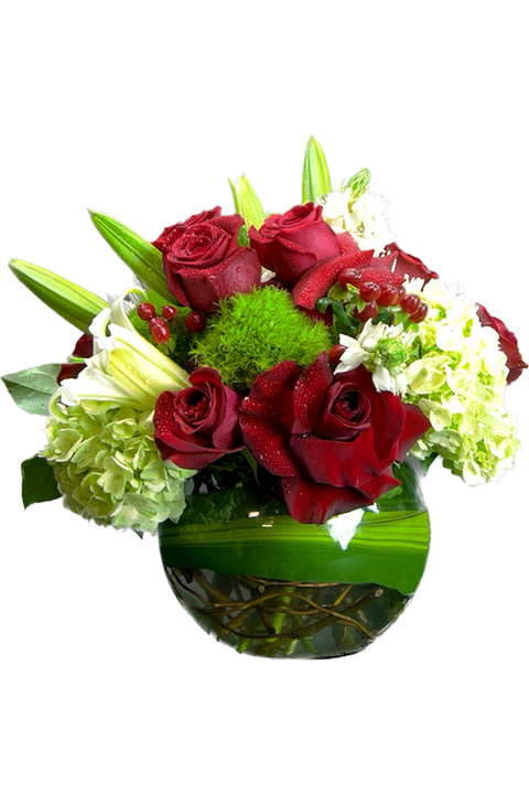 Elegant Bella’s Fish Bowl arrangement with red roses, lilies, green trick dianthus, and hydrangeas in a modern glass vase – New Jersey florist.