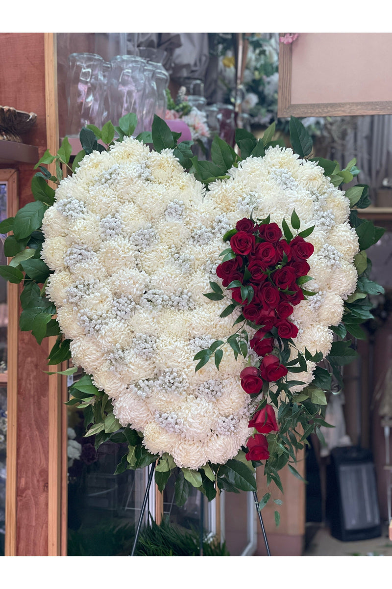 White chrysanthemum heart with cascading red roses – Bleeding Heart funeral standing spray by Eclore Floral, Hackensack NJ