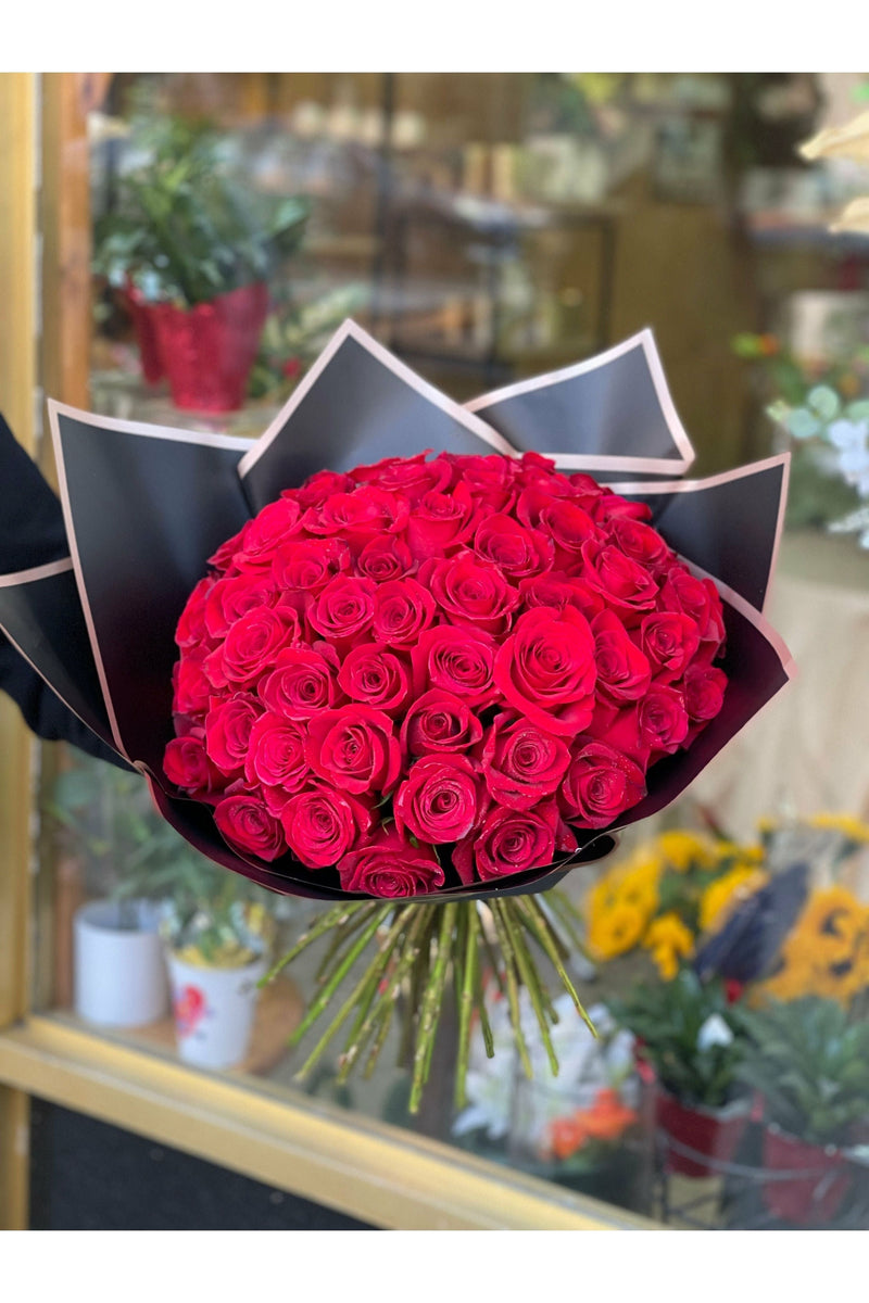 Luxurious bouquet of 60 red roses wrapped in black paper – Eclore Floral NJ