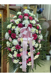 Pink and white standing spray with roses, carnations, and chrysanthemums — handcrafted by Eclore Floral in Hackensack, NJ