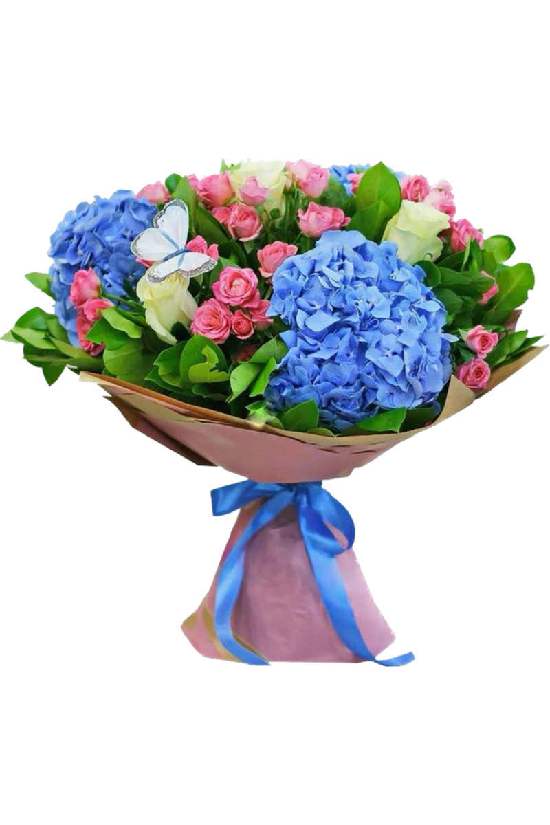 Fresh bouquet with blue hydrangeas, pink roses, white roses, and greenery wrapped in pink paper with a blue ribbon — New Jersey flower delivery.